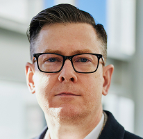 Alexander Hughes, CEO van een cryptohandelsbedrijf, portret